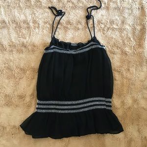 A black and white cropped tank top,